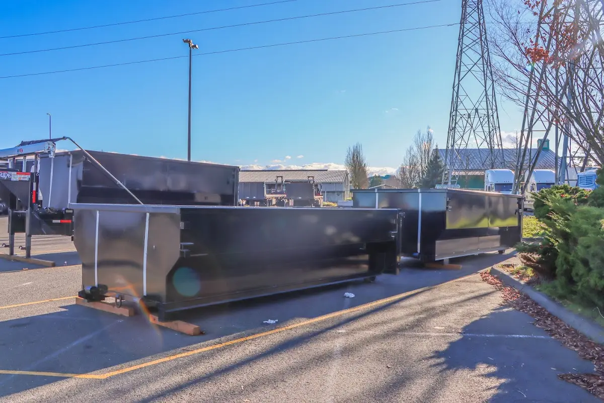 Roll-off dumpster ready for waste disposal at job site for 12 Yard Dumpster Rental in Moore